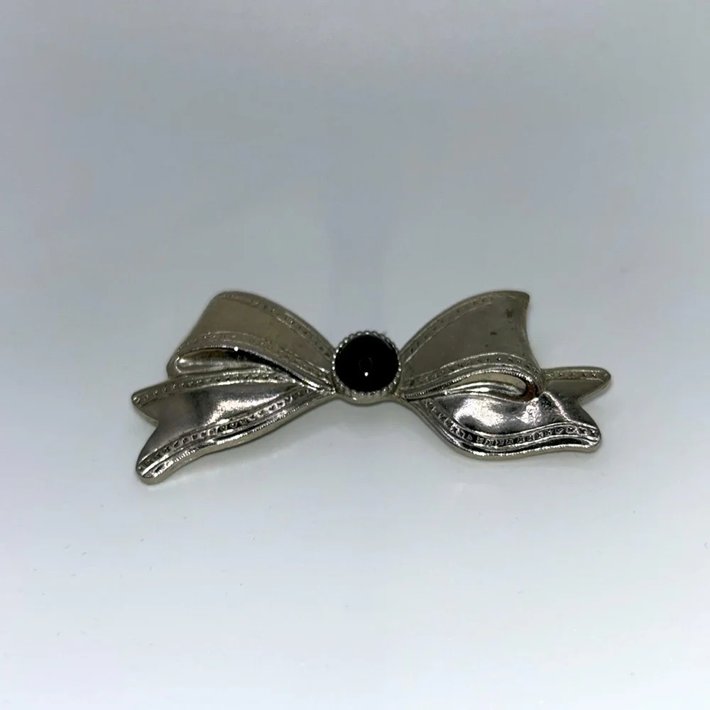 Silver Tone Bow Brooch with Black Center